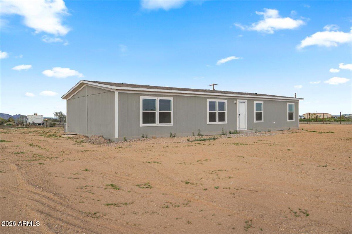 53512 West Organ Pipe Road Maricopa, AZ 85139 - Photo 4 of 44 a backyard of a house