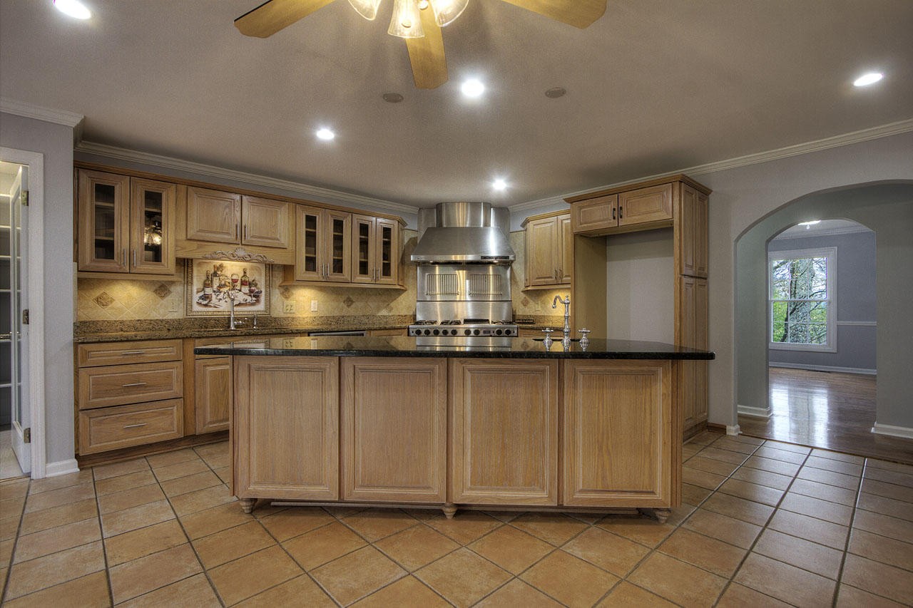428 Ferret Road Knoxville, TN 37934 - Photo 2 of 38 a kitchen with stainless steel appliances granite countertop a refrigerator and a stove