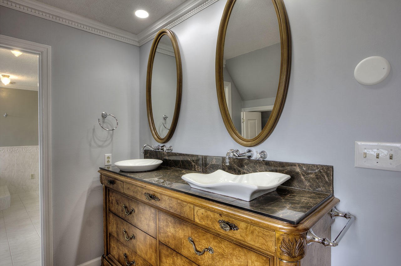 428 Ferret Road Knoxville, TN 37934 - Photo 24 of 38 a bathroom with a sink and a mirror