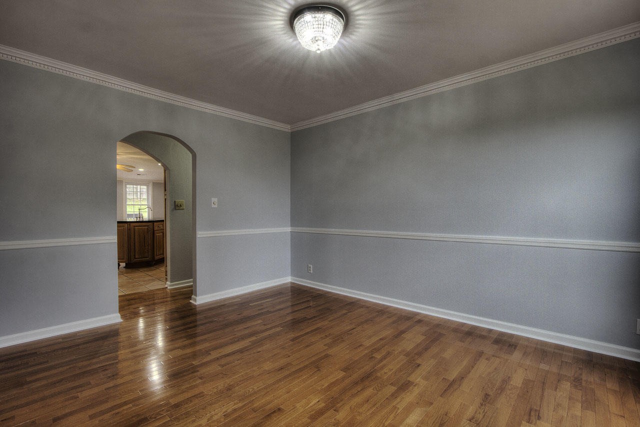 428 Ferret Road Knoxville, TN 37934 - Photo 7 of 38 a view of empty room with wooden floor and fan