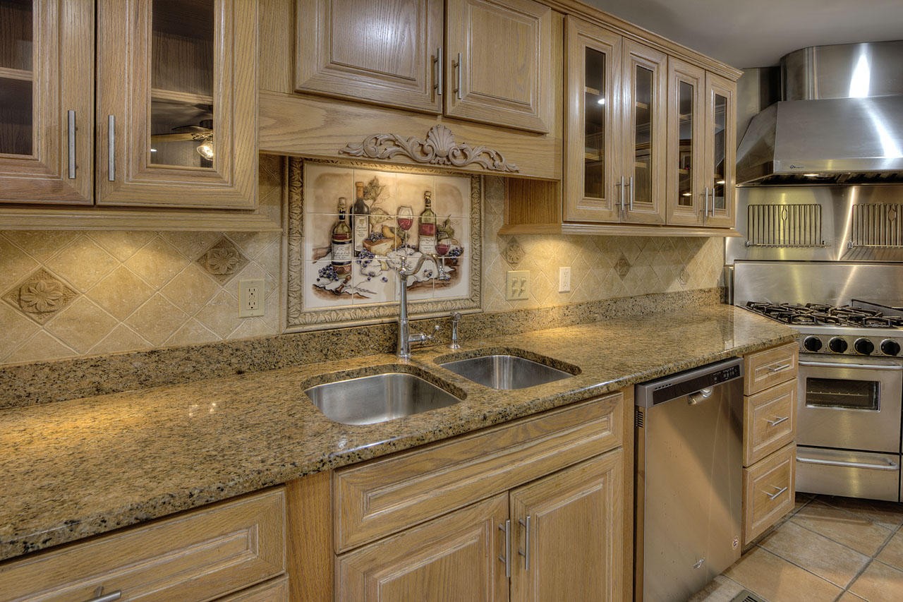428 Ferret Road Knoxville, TN 37934 - Photo 8 of 38 a kitchen with granite countertop a sink and a stove
