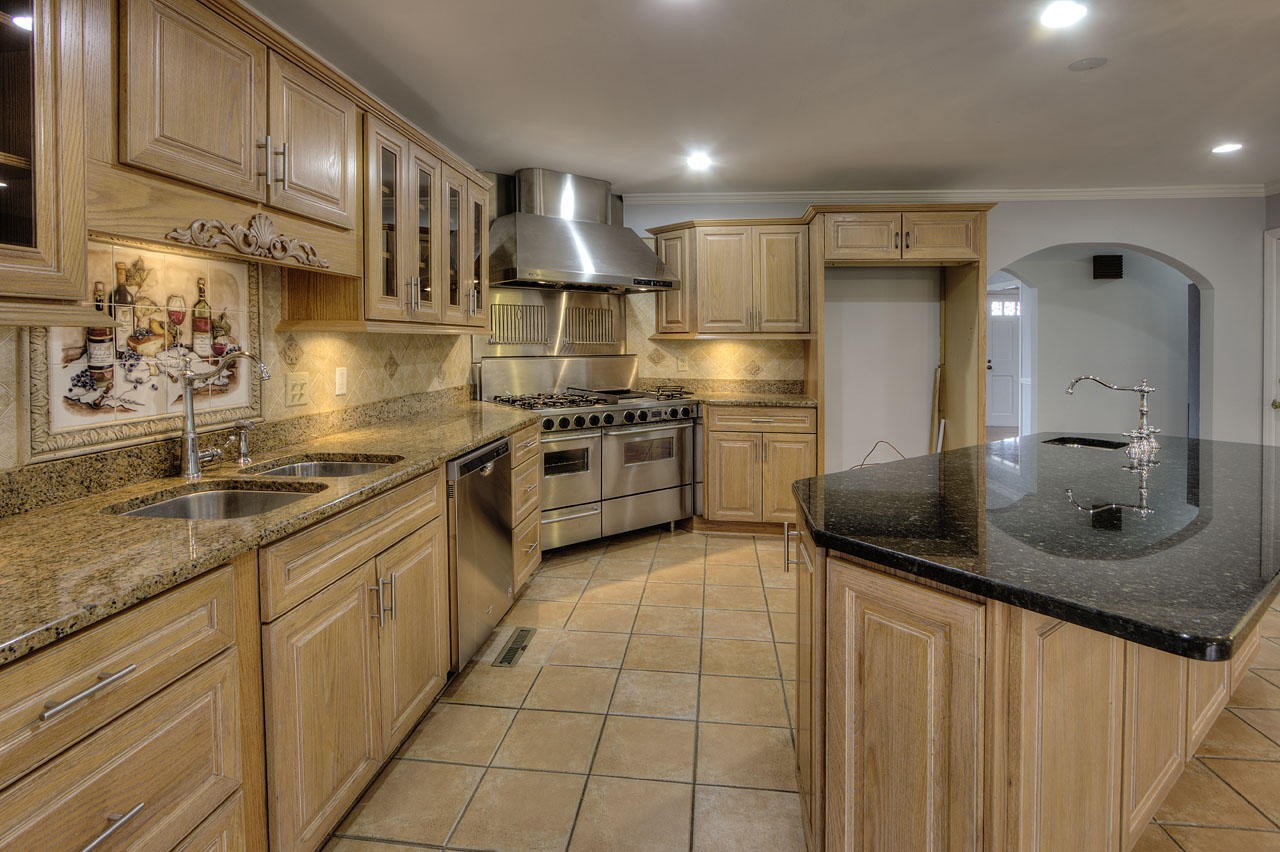 428 Ferret Road Knoxville, TN 37934 - Photo 9 of 38 a kitchen with stainless steel appliances granite countertop a sink and cabinets