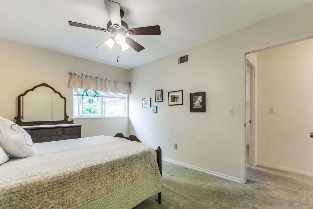 9140 Inverness Road Santee, CA 92071 - Photo 27 of 41 a bedroom with a bed and a window