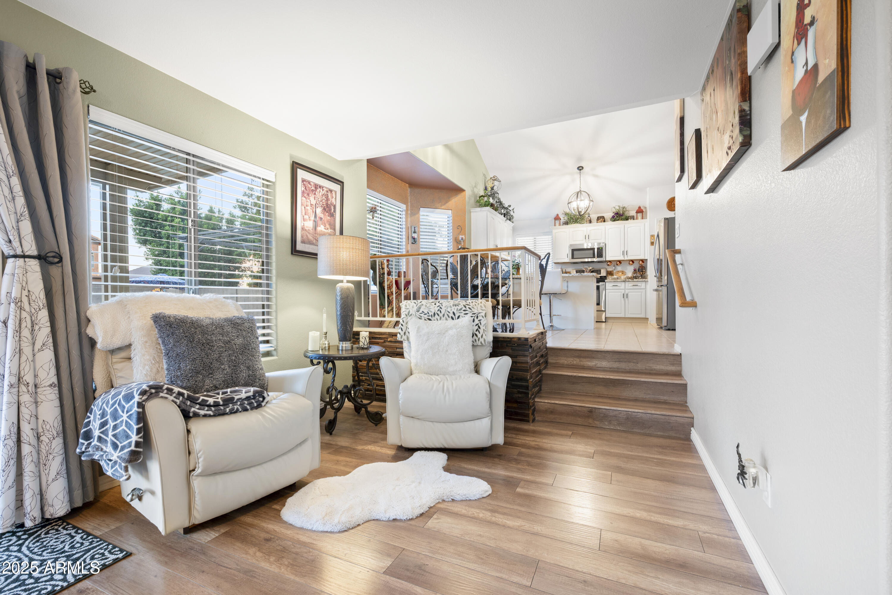 6419 West Briles Road Phoenix, AZ 85083 - Photo 13 of 28 a living room with furniture and a large window