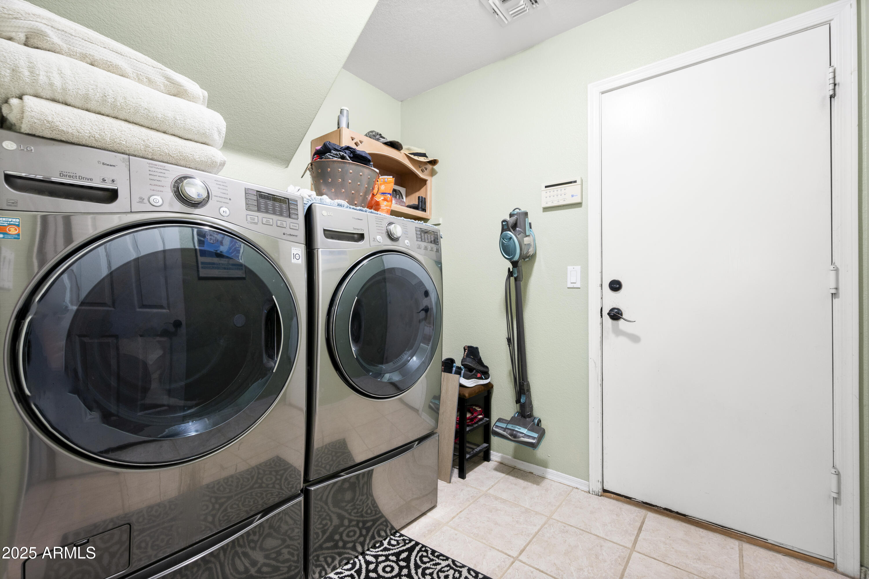 6419 West Briles Road Phoenix, AZ 85083 - Photo 15 of 28 a utility room with dryer and washer