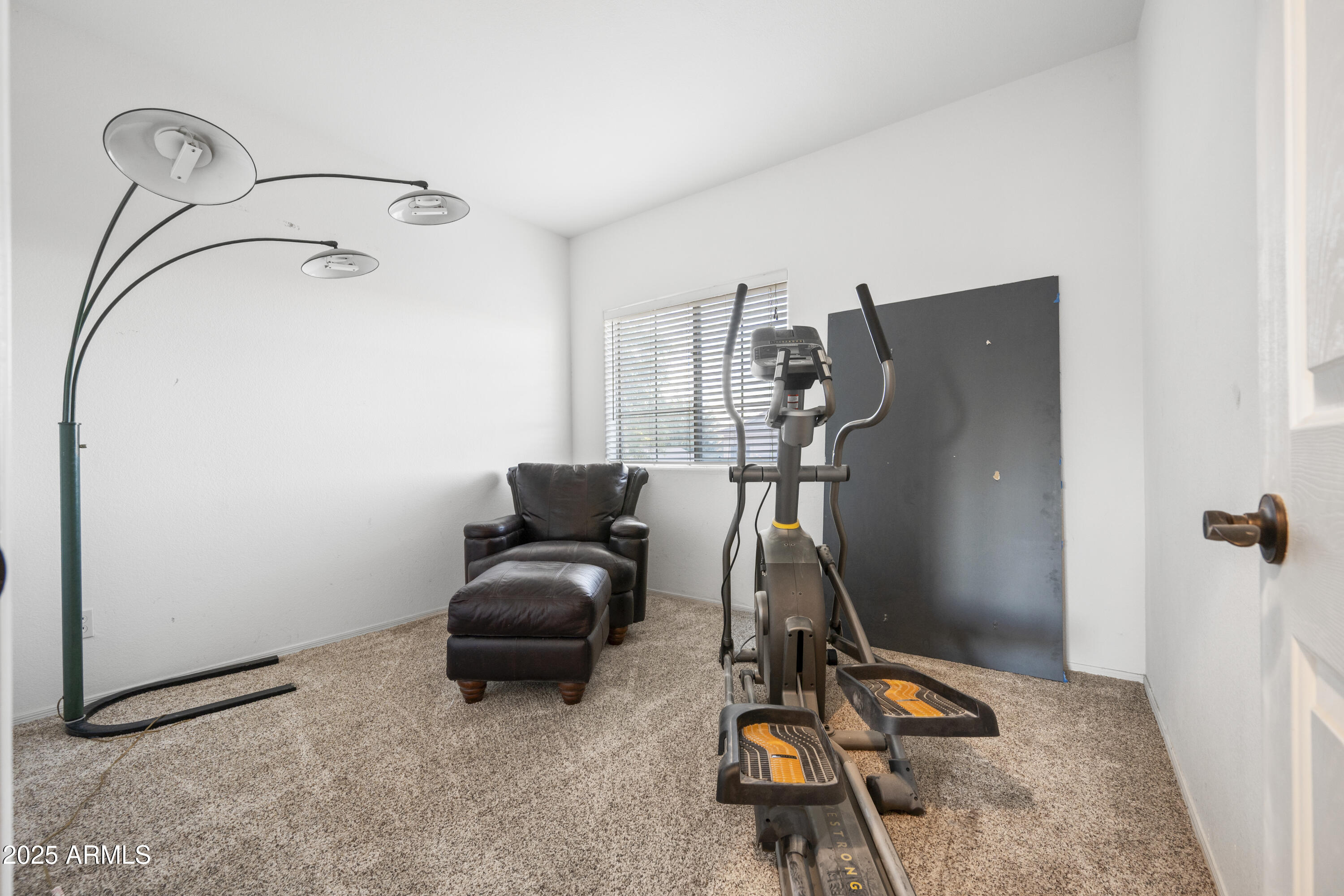 6419 West Briles Road Phoenix, AZ 85083 - Photo 21 of 28 a living room with furniture and a air conditioner vent