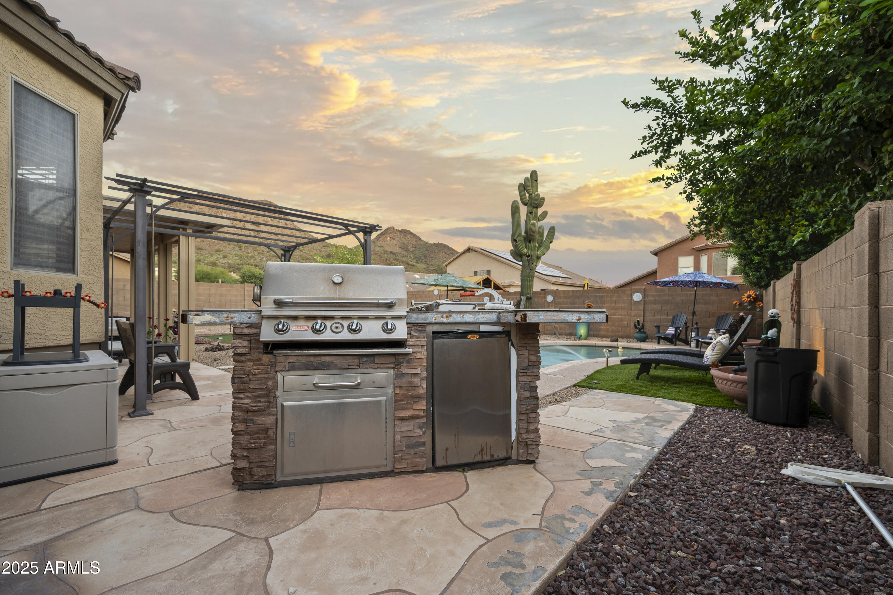 6419 West Briles Road Phoenix, AZ 85083 - Photo 25 of 28 a view of a kitchen with a sink and dishwasher