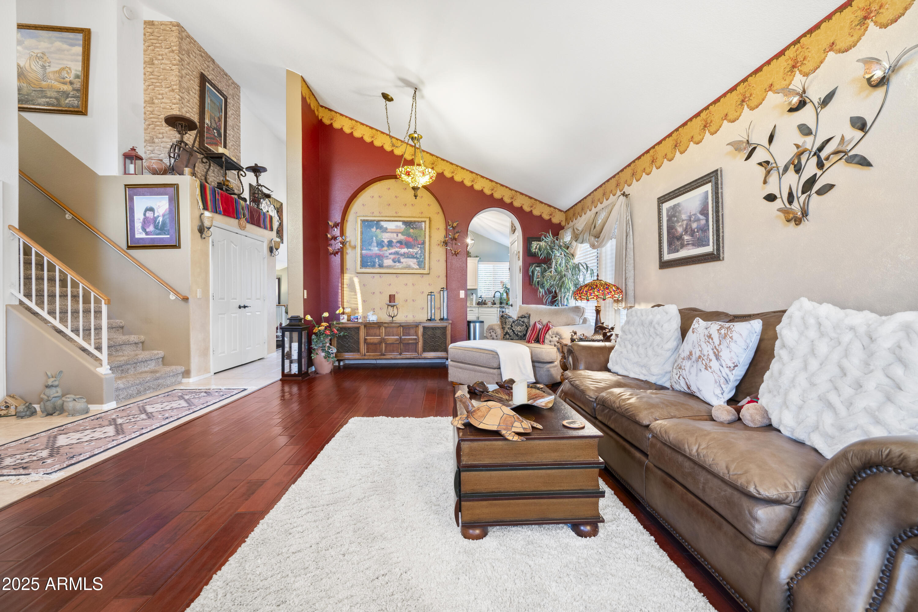 6419 West Briles Road Phoenix, AZ 85083 - Photo 7 of 28 a living room with furniture and a large window