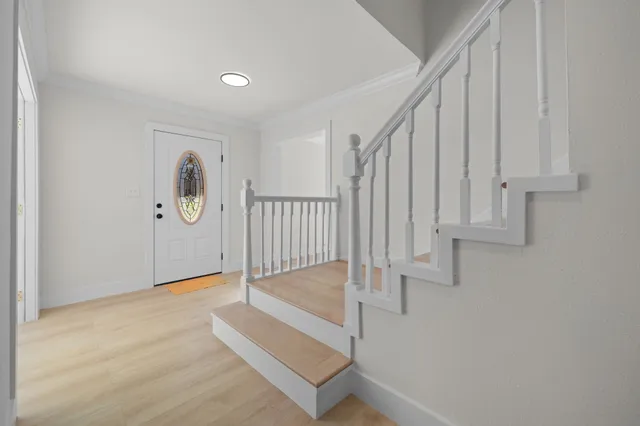 a view of entryway with stairs