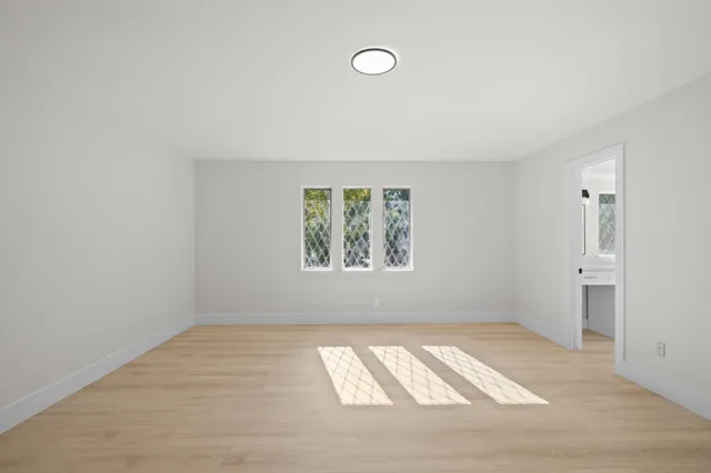 an empty room with windows