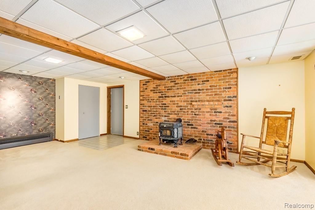 5180 Brady Road Howell, MI 48843 - Photo 21 of 29 Family room wood stove