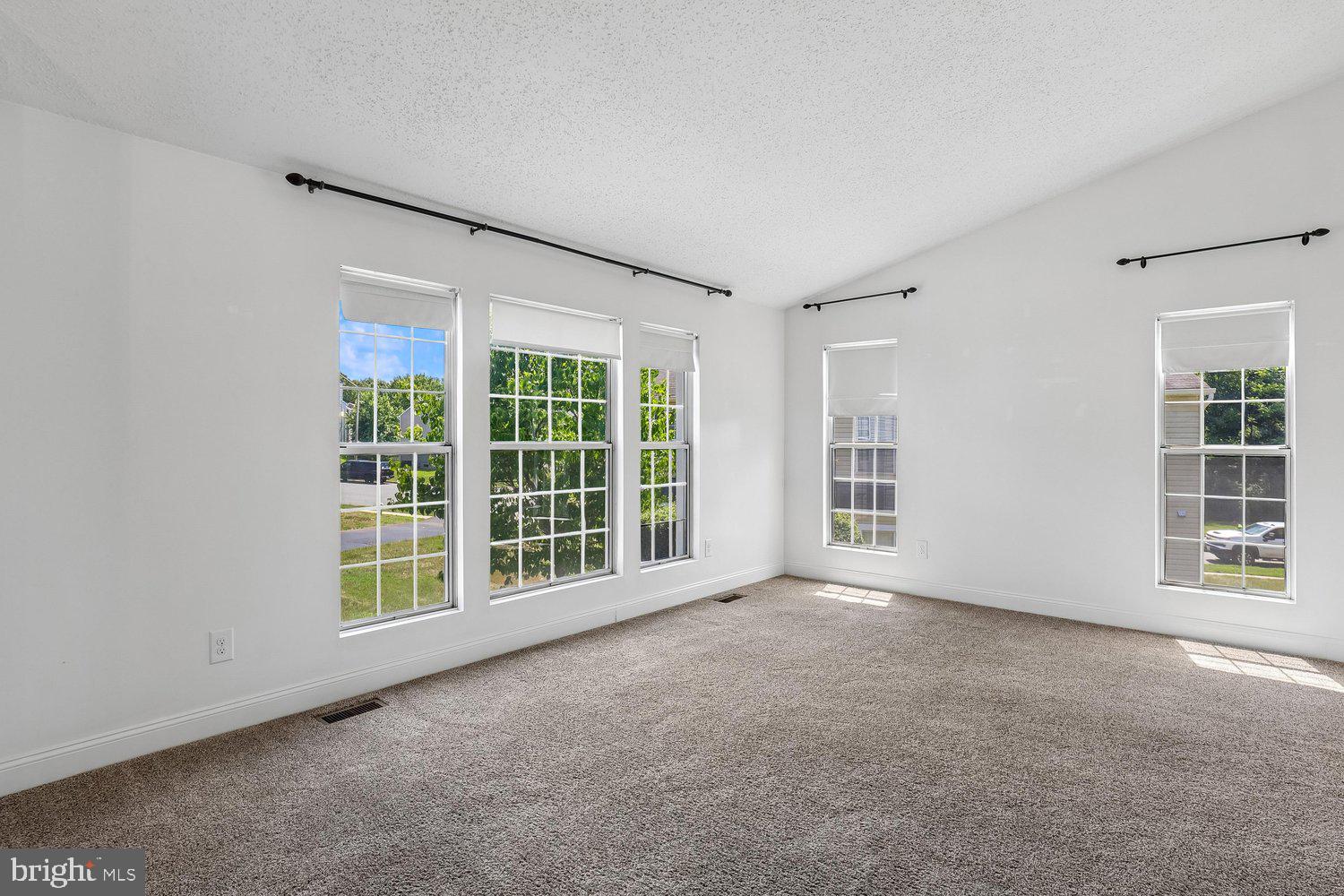 15764 Beau Ridge Drive Woodbridge, VA 22193 - Photo 4 of 58 a view of an empty room with a window