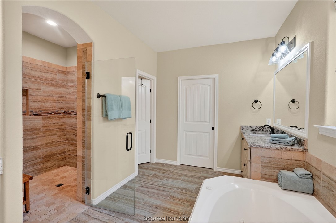 2004 Lexi Lane Bryan, TX 77807 - Photo 22 of 47 a bedroom with a bed and a shower