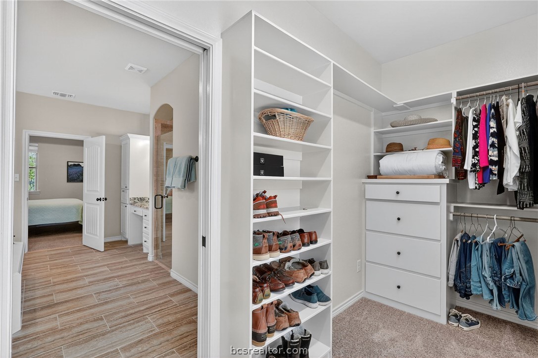 2004 Lexi Lane Bryan, TX 77807 - Photo 29 of 47 a view of a bedroom with a furniture and closet