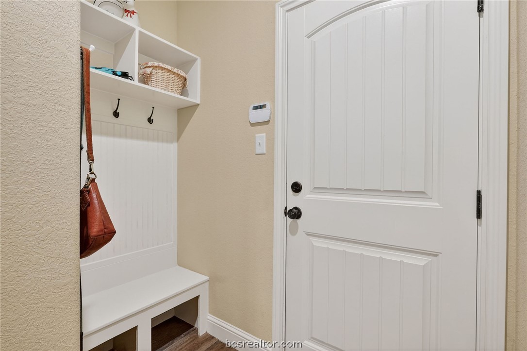 2004 Lexi Lane Bryan, TX 77807 - Photo 35 of 47 a bathroom with a sink and a mirror