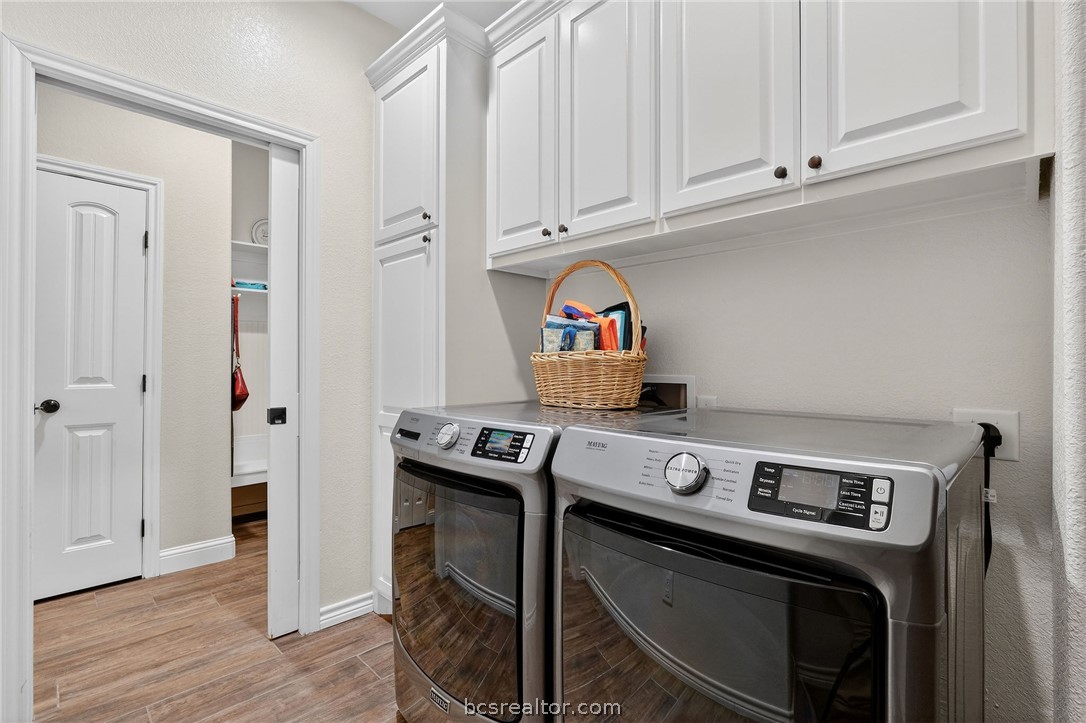 2004 Lexi Lane Bryan, TX 77807 - Photo 36 of 47 a utility room with dryer and washer