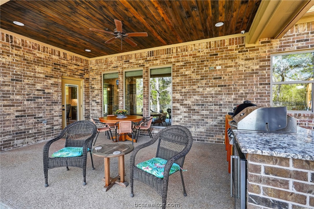 2004 Lexi Lane Bryan, TX 77807 - Photo 38 of 47 a backyard of a house with outdoor seating