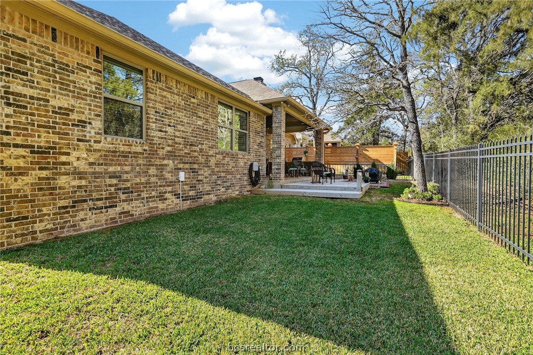 2004 Lexi Lane Bryan, TX 77807 - Photo 40 of 47 a view of a house with a yard and sitting area