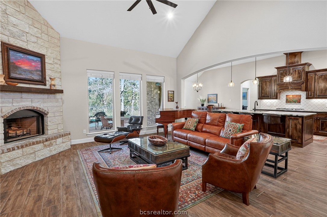2004 Lexi Lane Bryan, TX 77807 - Photo 4 of 47 a living room with furniture large window and a fireplace