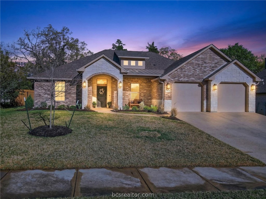 2004 Lexi Lane Bryan, TX 77807 - Photo 43 of 47 a view of a house with a yard