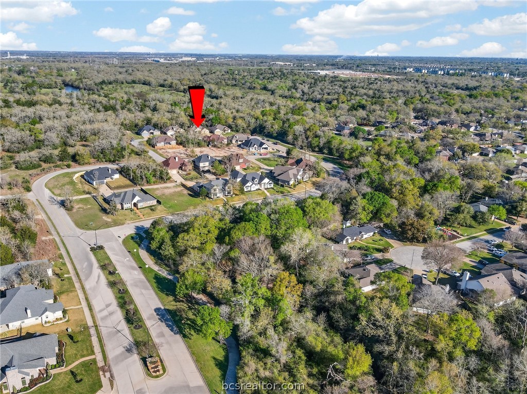 2004 Lexi Lane Bryan, TX 77807 - Photo 46 of 47 an aerial view of residential houses with outdoor space and trees