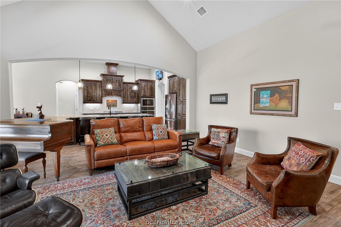 2004 Lexi Lane Bryan, TX 77807 - Photo 6 of 47 a living room with furniture and wooden floor