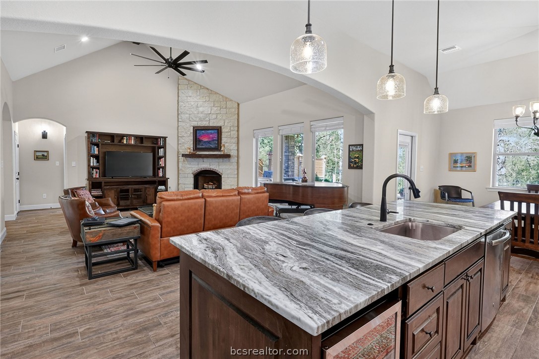 2004 Lexi Lane Bryan, TX 77807 - Photo 7 of 47 a living room with granite countertop furniture and a flat screen tv