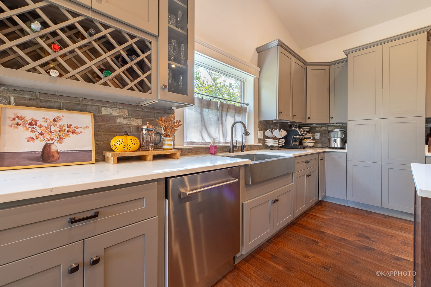 249 Easy Street Lake Holiday, IL 60552 - Photo 11 of 42 a kitchen with a sink cabinets and wooden floor