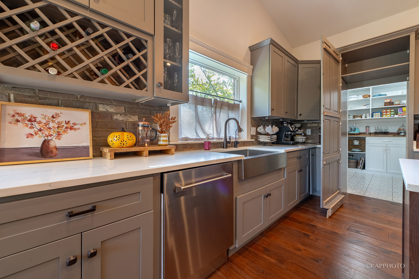 249 Easy Street Lake Holiday, IL 60552 - Photo 12 of 42 a kitchen with stainless steel appliances a sink dishwasher stove and wooden floor