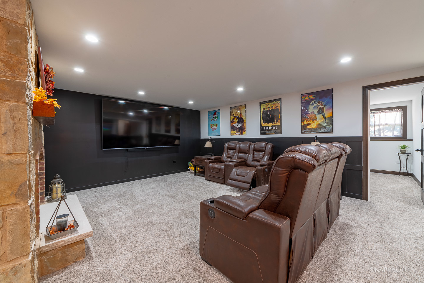 249 Easy Street Lake Holiday, IL 60552 - Photo 27 of 42 a living room with couches and projector with a flat screen tv