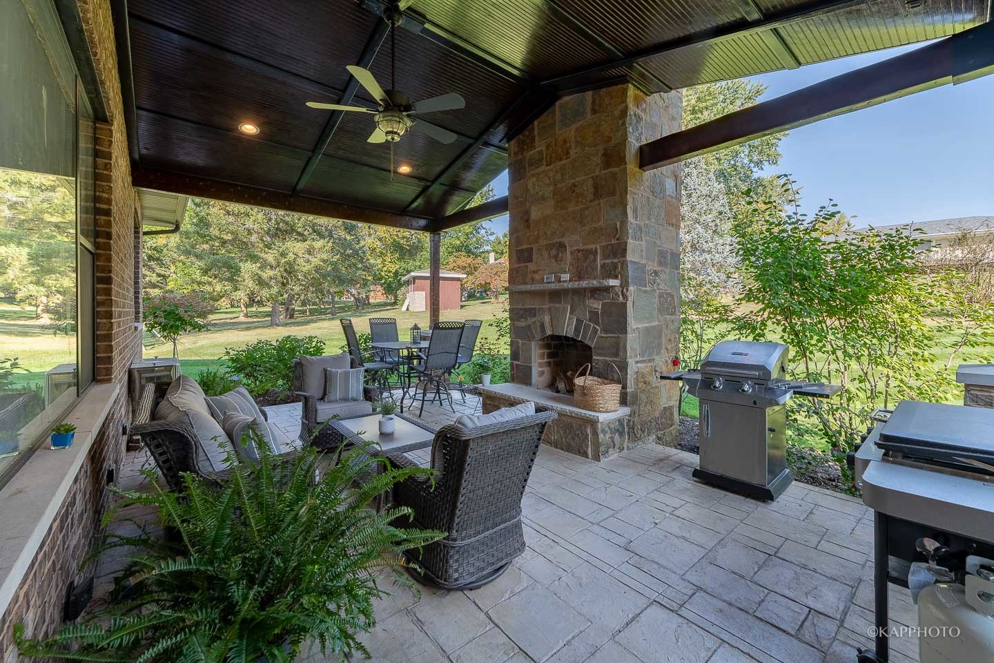 249 Easy Street Lake Holiday, IL 60552 - Photo 41 of 42 a living room with patio furniture and a garden