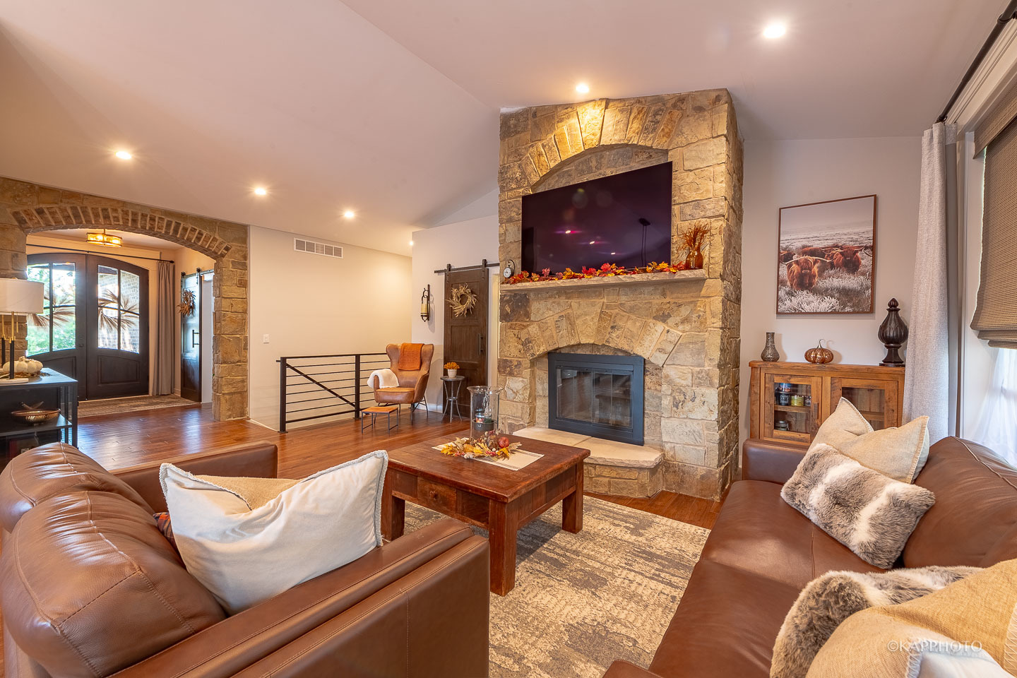 249 Easy Street Lake Holiday, IL 60552 - Photo 8 of 42 a living room with furniture a flat screen tv and a fireplace