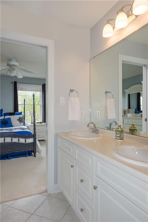 2019 Condor Lane Gibsonia, PA 15044 - Photo 26 of 39 a spacious bathroom with a double vanity sink and a mirror