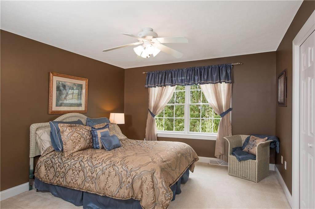 2019 Condor Lane Gibsonia, PA 15044 - Photo 28 of 39 a bedroom with a bed and a large window