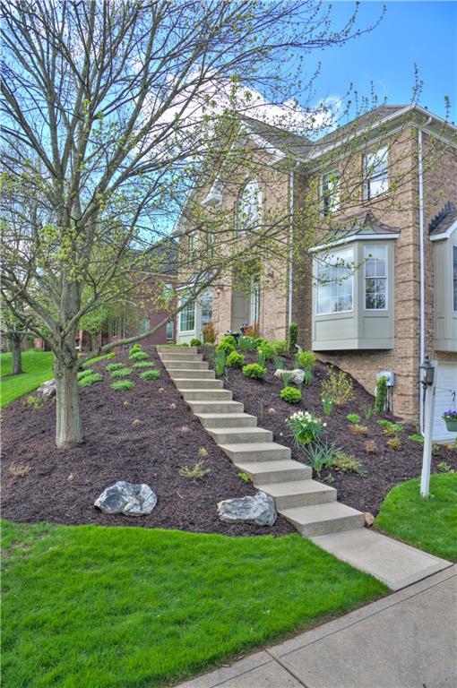 2019 Condor Lane Gibsonia, PA 15044 - Photo 4 of 39 a view of a building with a garden