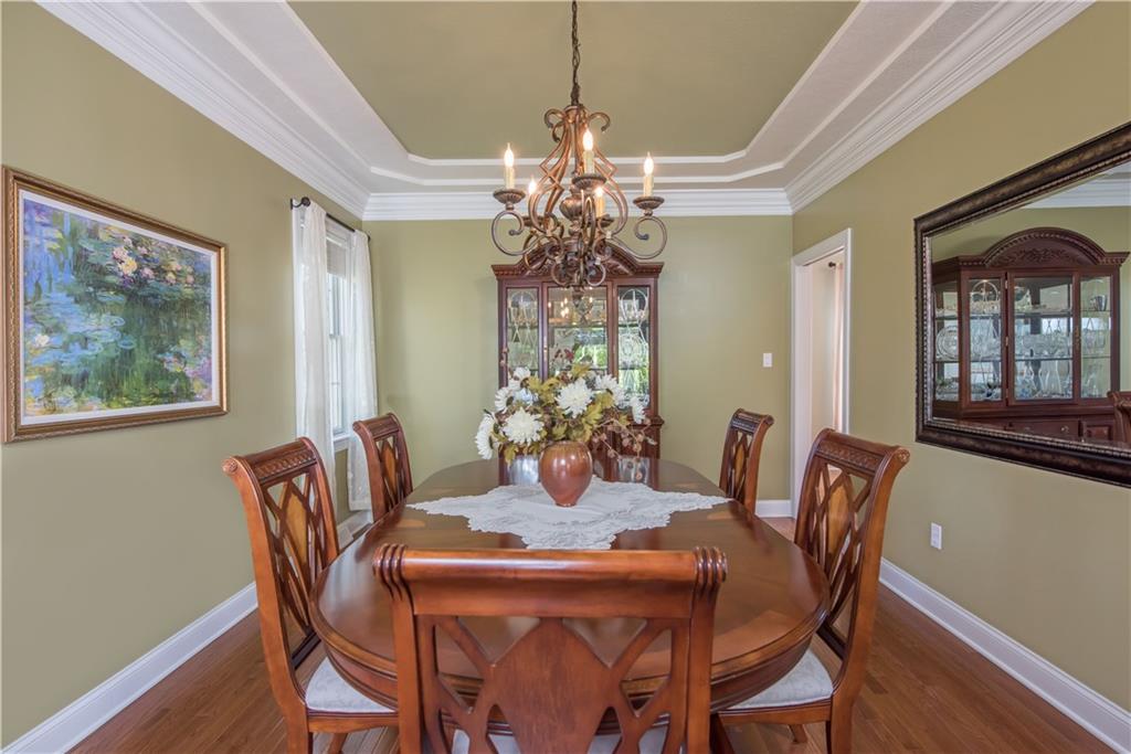 2019 Condor Lane Gibsonia, PA 15044 - Photo 9 of 39 a dining room with furniture a chandelier and window