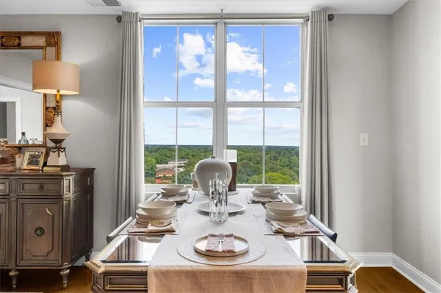 a kitchen with stainless steel appliances granite countertop sink stove and cabinets