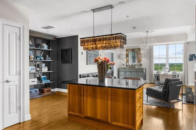 a en suite bathroom with a double vanity sink and a mirror