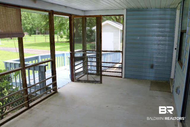 12678 Bender Road Foley, AL 36535 - Photo 3 of 20 Screened back porch overlooks the huge back yard