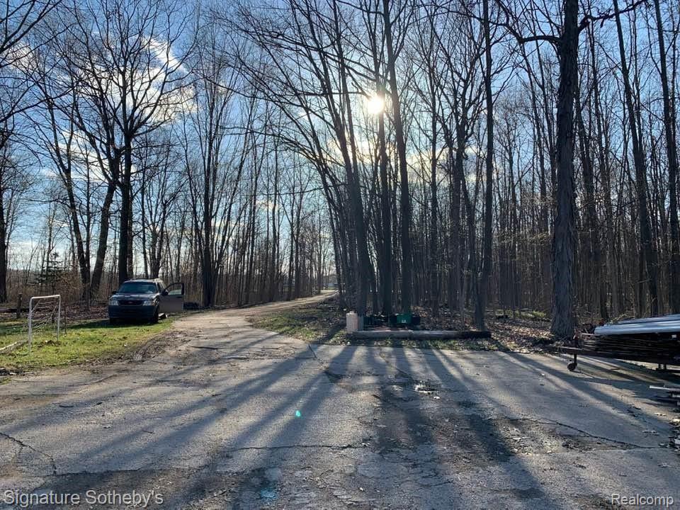 5076 Argentine Road Howell, MI 48855 - Photo 7 of 16 Paved gated driveway