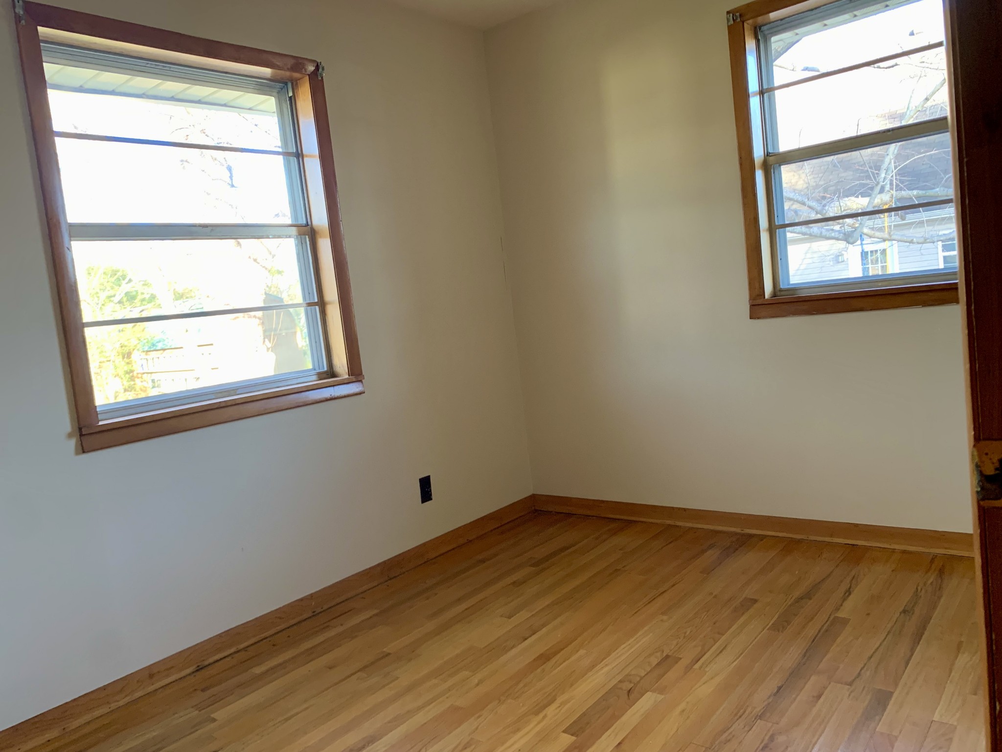 807 Days Road Lafayette, TN 37083 - Photo 14 of 14 a view of an empty room with wooden floor and a window