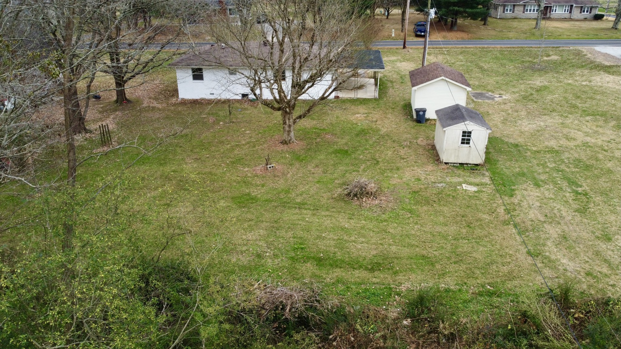807 Days Road Lafayette, TN 37083 - Photo 4 of 14 a front view of a house with garden