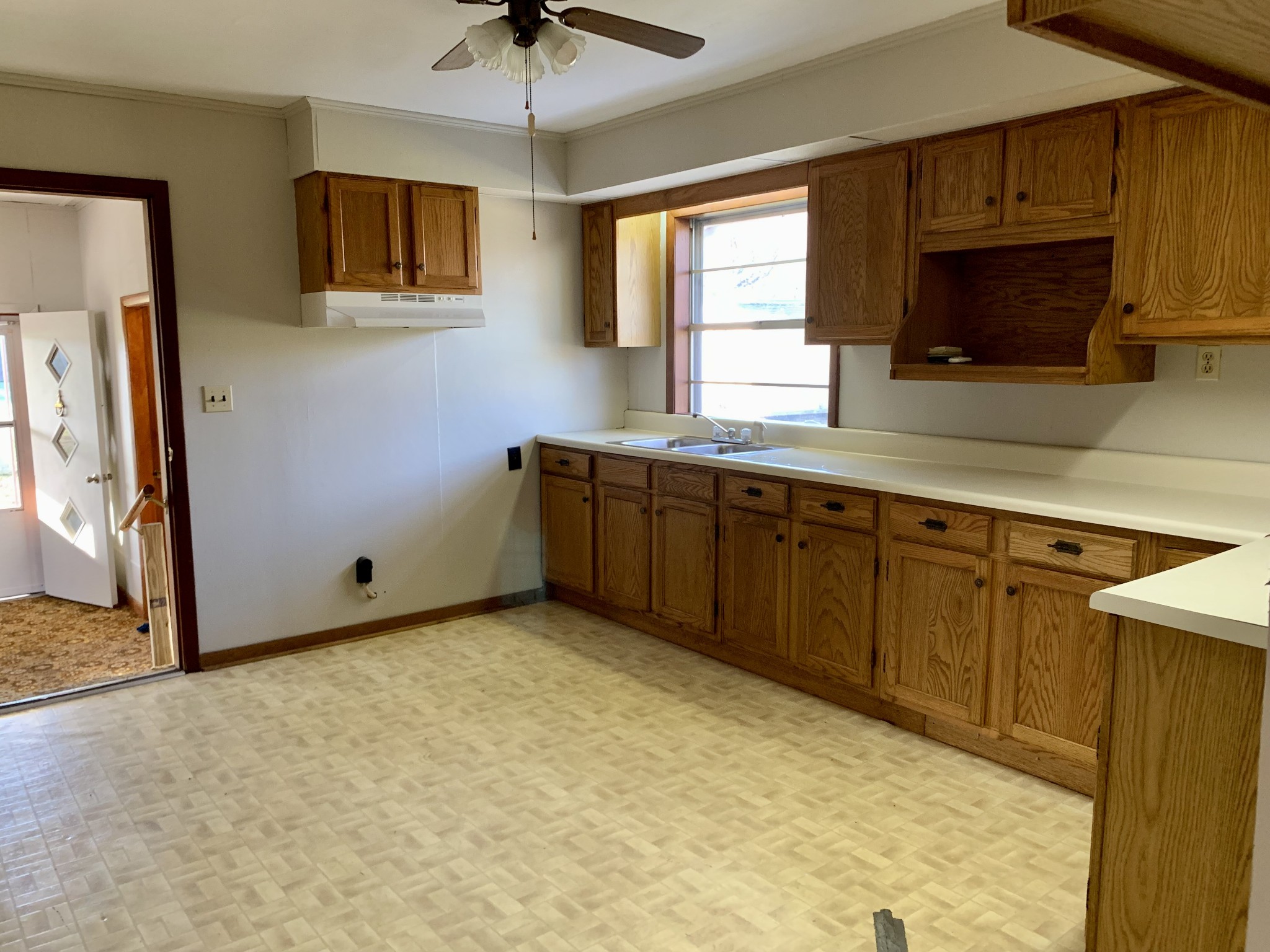 807 Days Road Lafayette, TN 37083 - Photo 6 of 14 a kitchen with stainless steel appliances granite countertop a stove a sink and a microwave