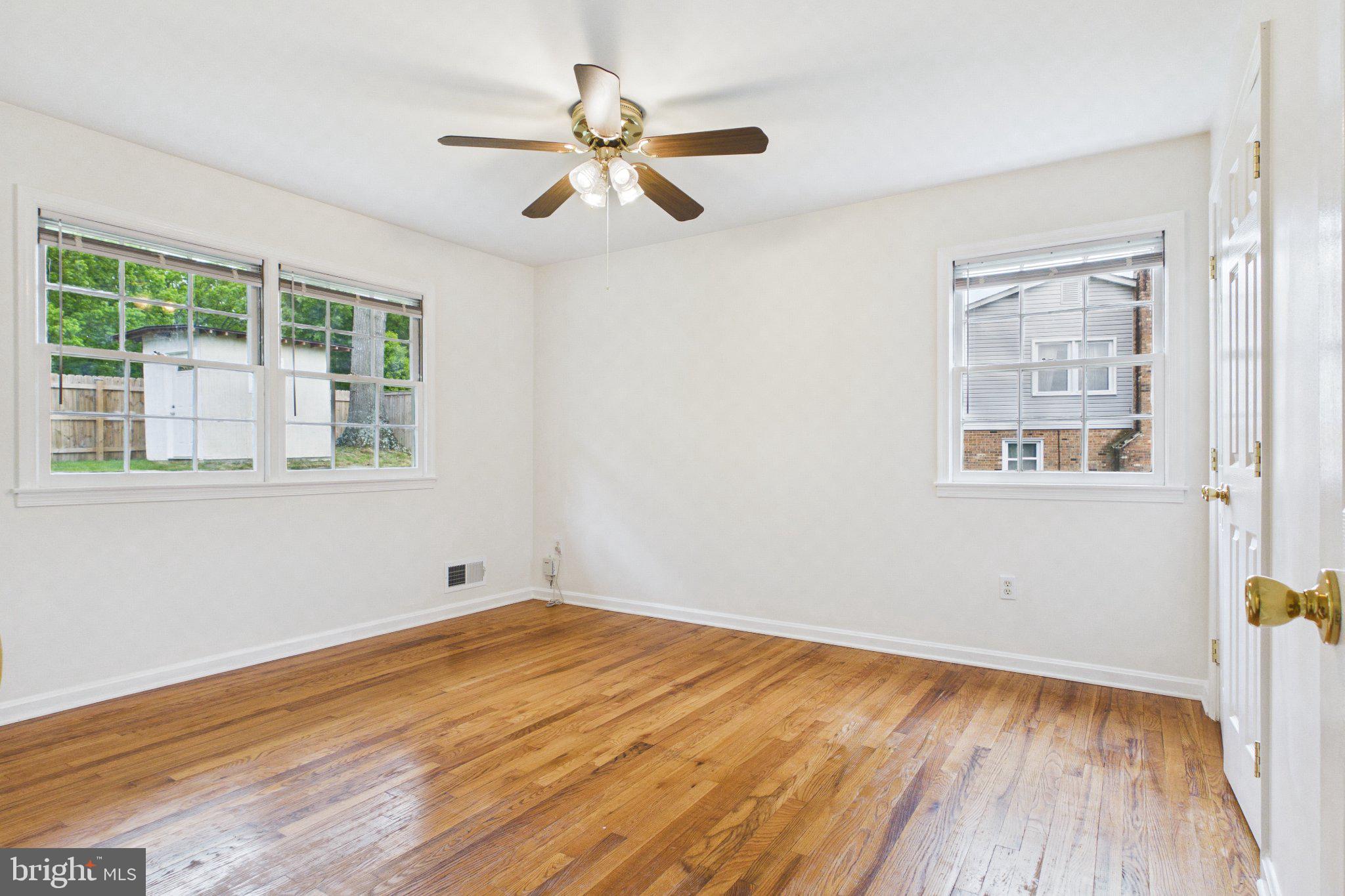 13235 Sturbridge Road Woodbridge, VA 22192 - Photo 46 of 53 Bright and airy room with hardwood floors.