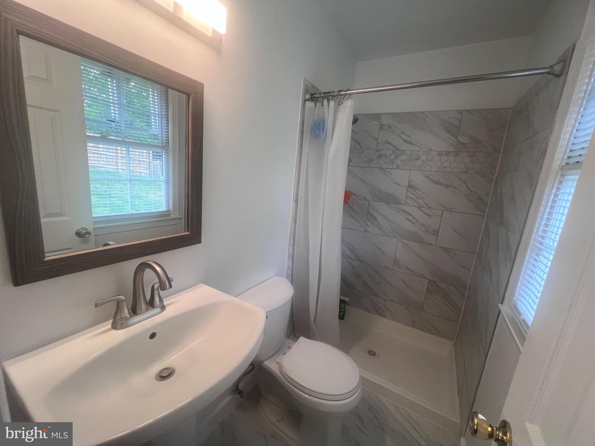 13235 Sturbridge Road Woodbridge, VA 22192 - Photo 8 of 53 Modern bathroom with elegant finishes.