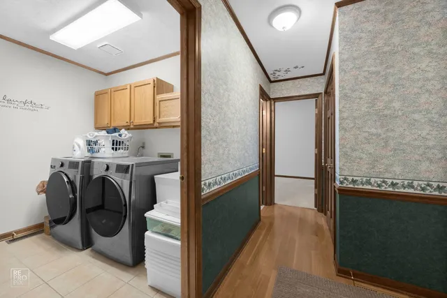 a living room with bed furniture and a rug