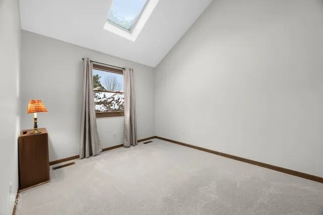 a view of a room with lots of gym equipment