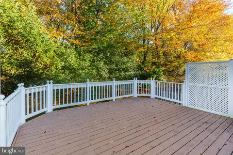 a view of a wooden roof deck