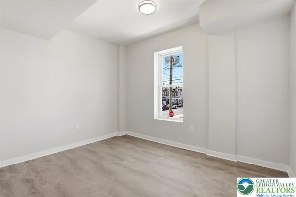 an empty room with windows