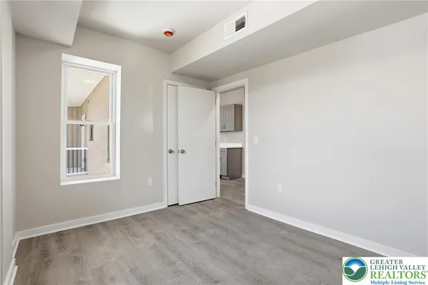 an empty room with windows